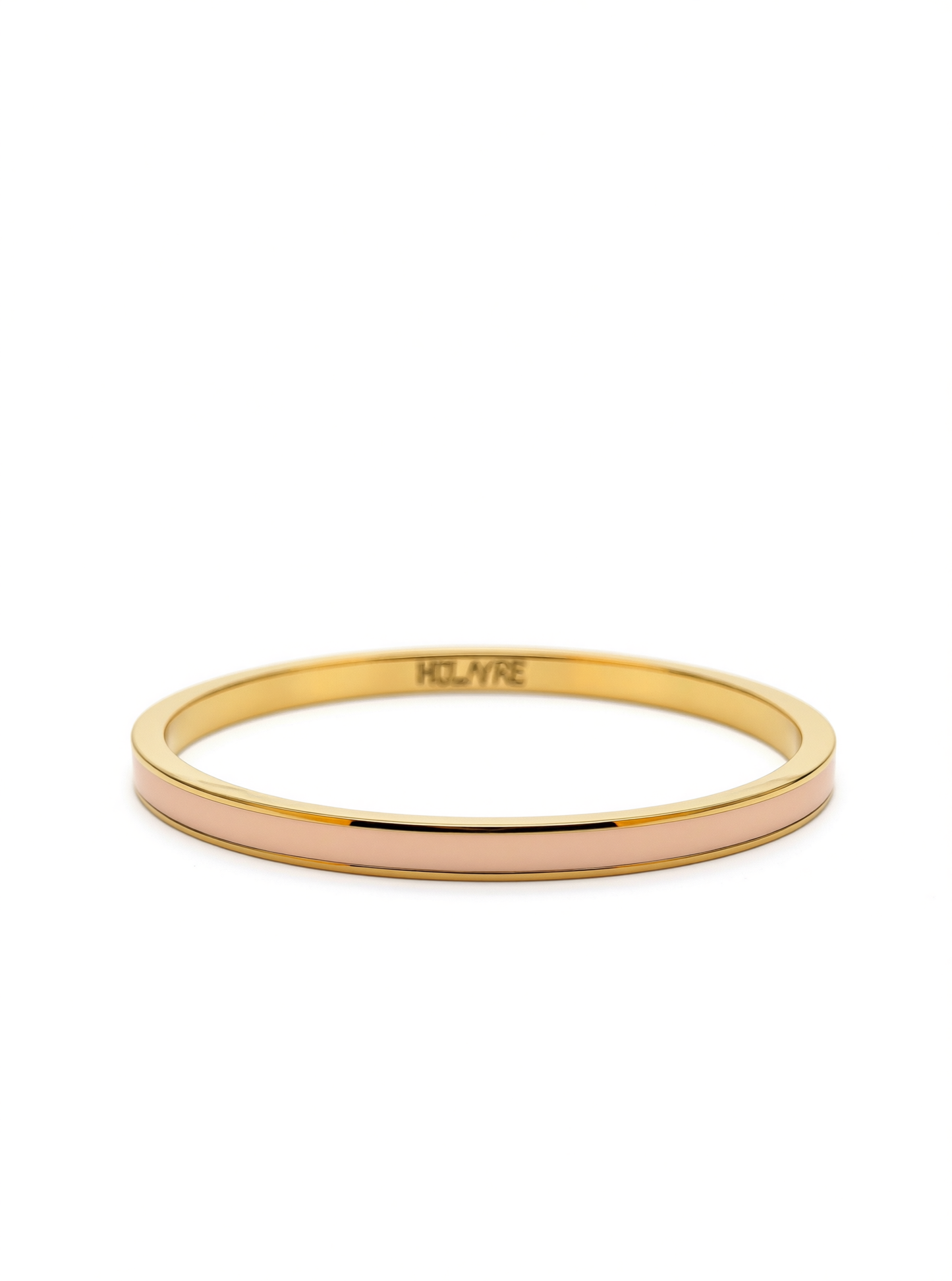 Layer bangle in 18k yellow gold with dusty pink enamel on a white background.