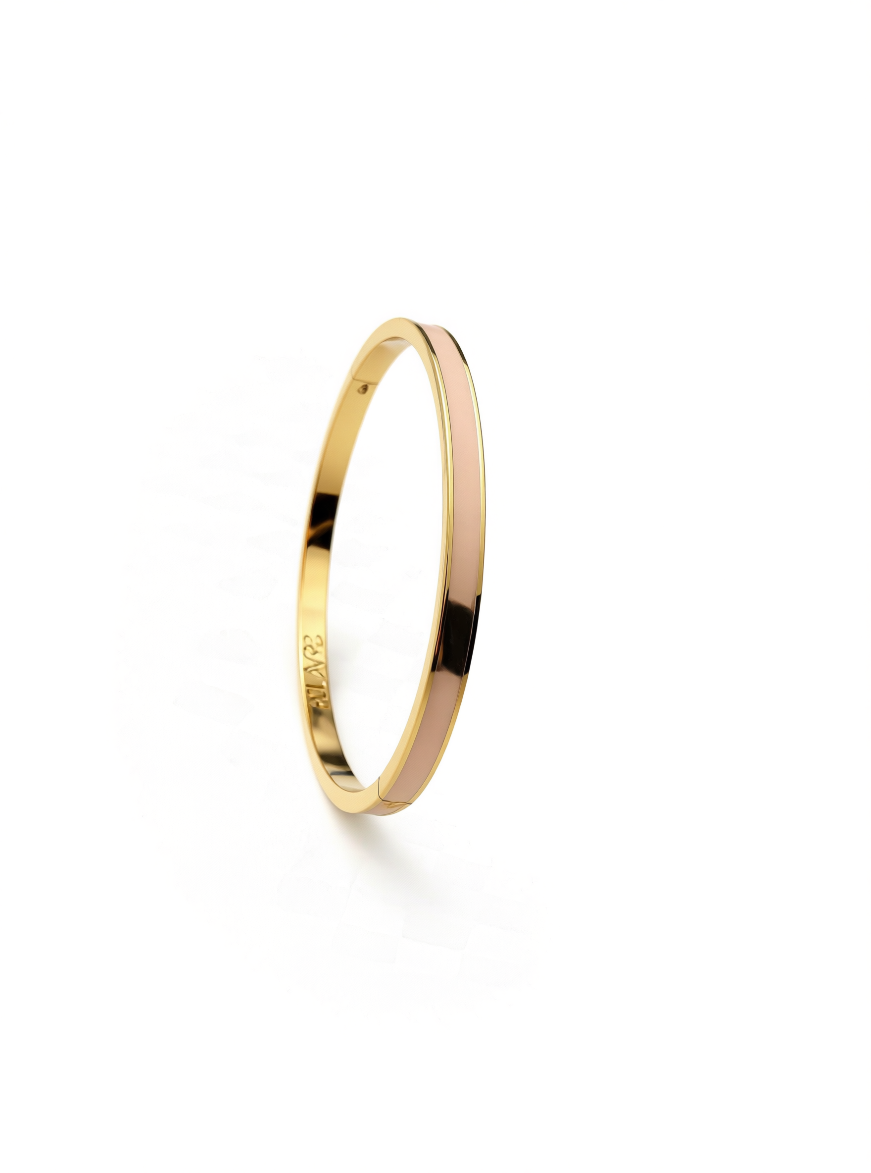 Layer bangle in 18k yellow gold with dusty pink enamel on a white background.