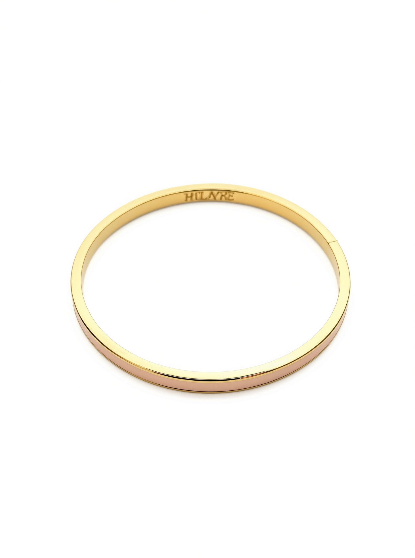 Layer bangle in 18k yellow gold with dusty pink enamel on a white background.