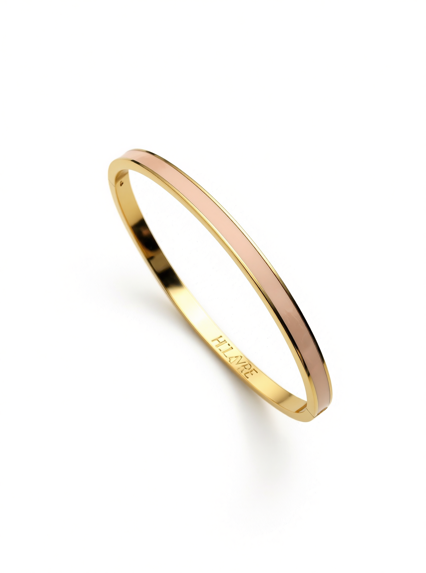 Layer bangle in 18k yellow gold with dusty pink enamel on a white background.