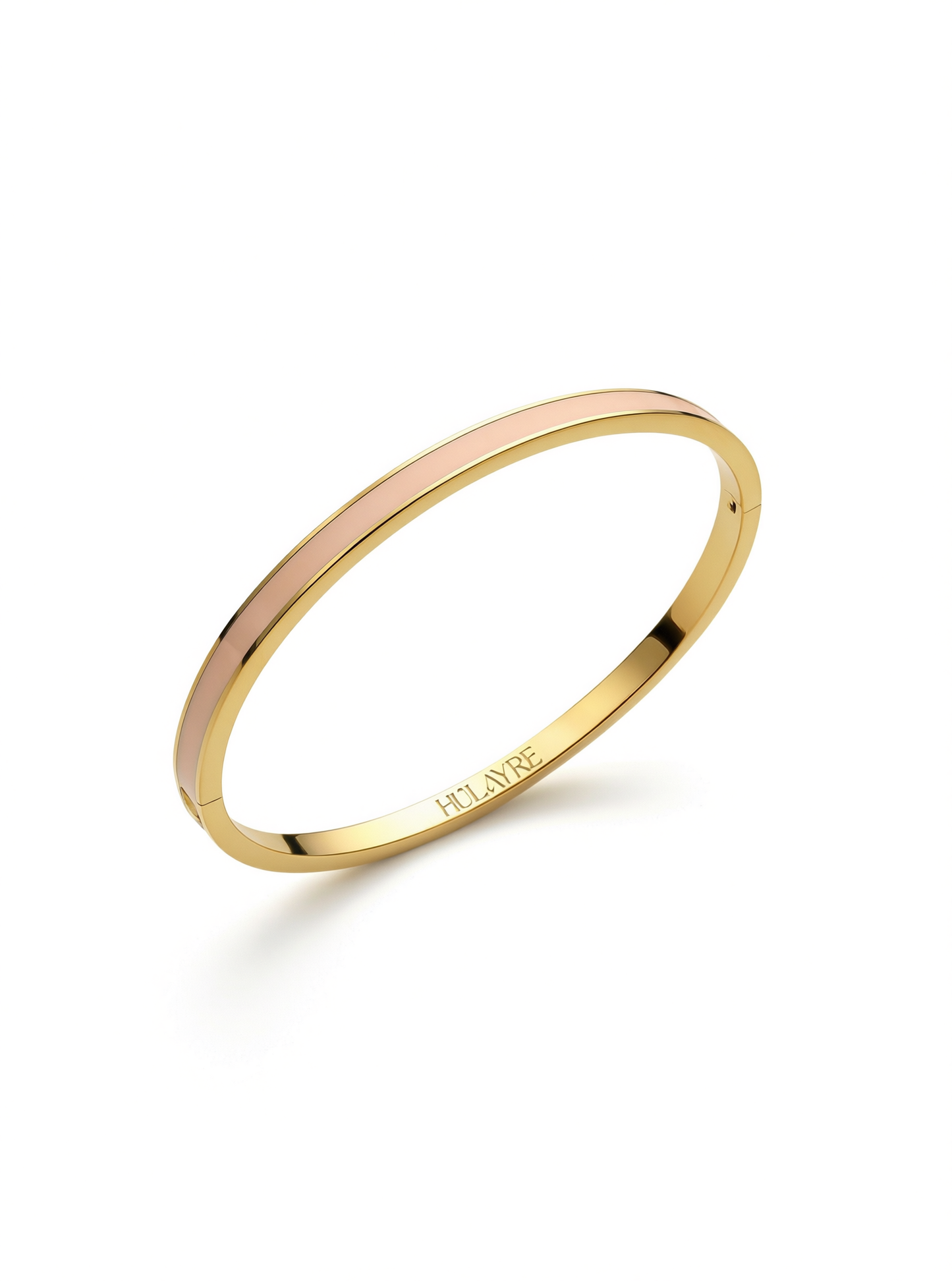 Layer bangle in 18k yellow gold with dusty pink enamel on a white background.